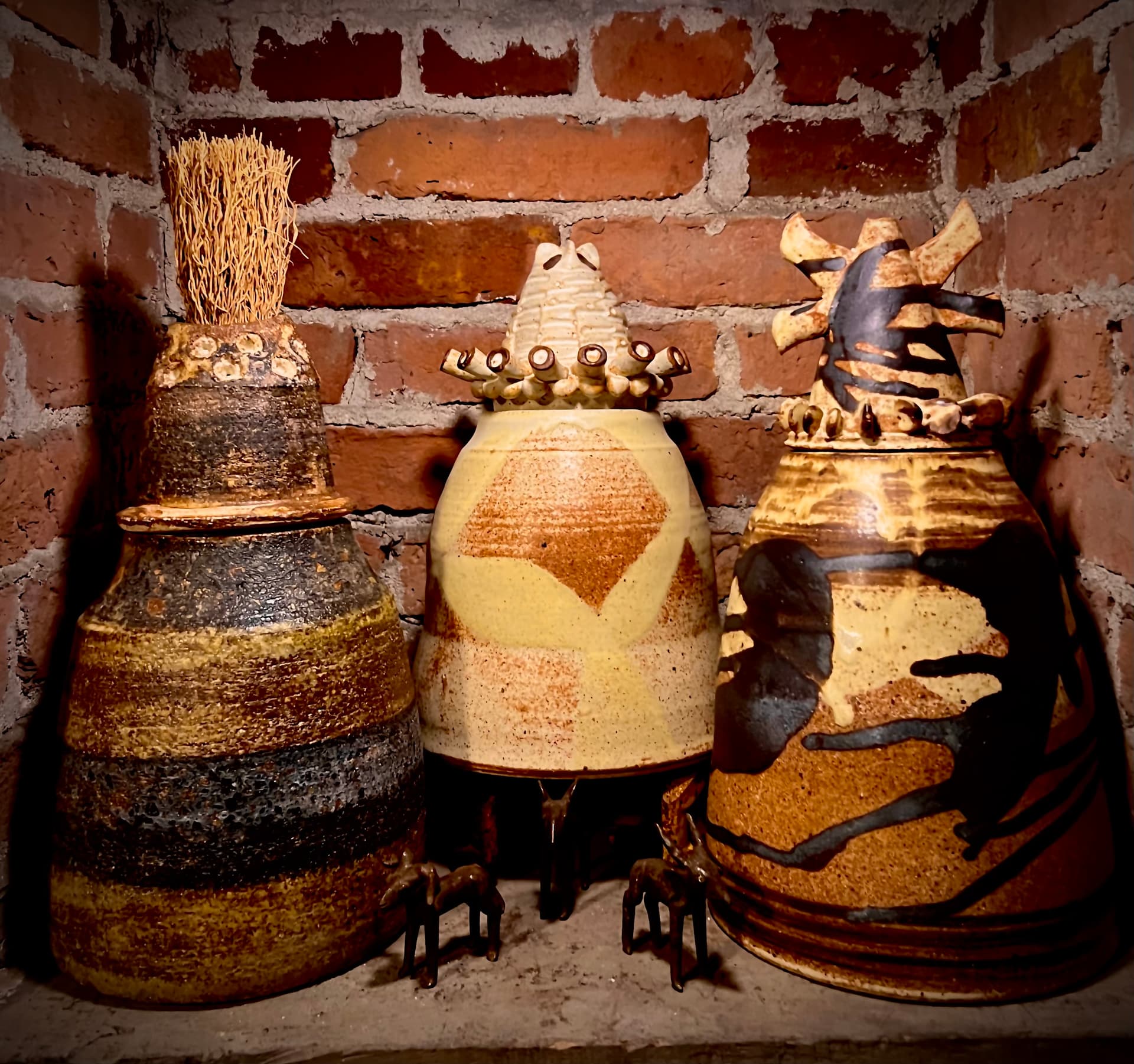 Barbara's urns against the brick